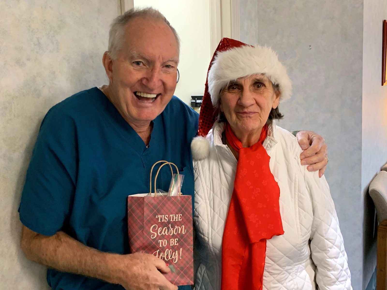 Dr. Tobin with a long-time patient who stopped in at Christmas with a gift